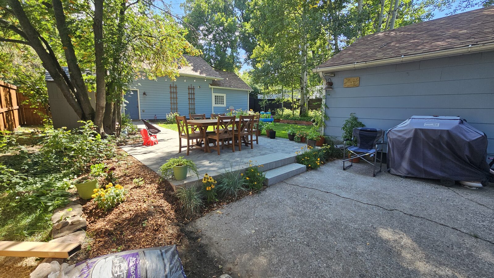 Custom paver patio and cedar fence outdoor living project